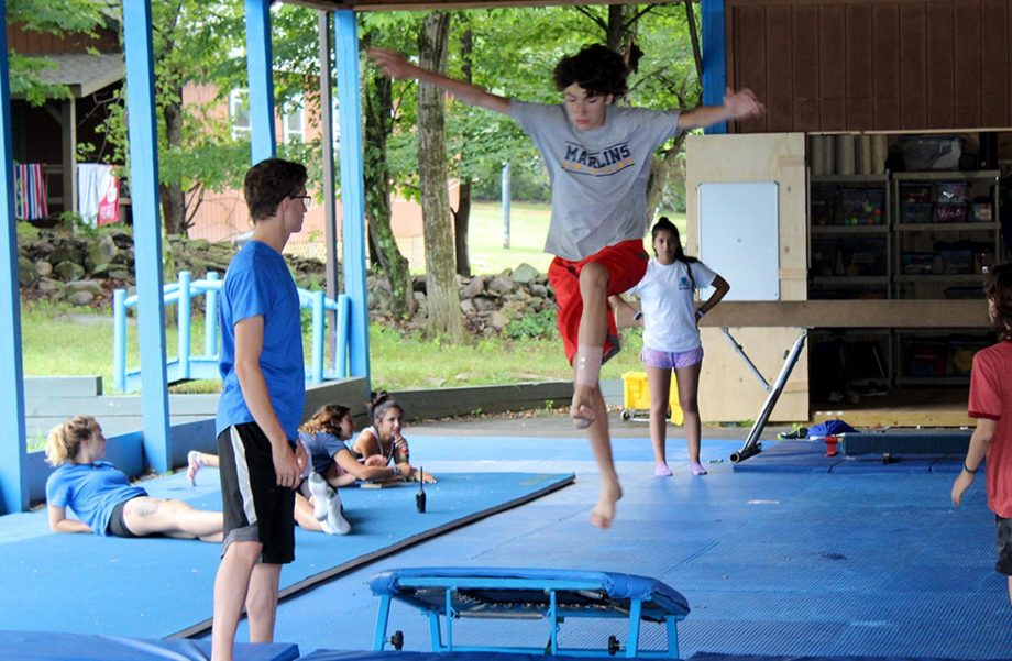 Boy jumping on vault