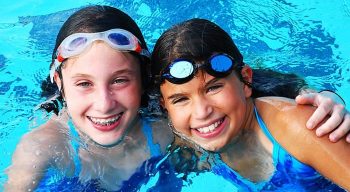 Two girls in swimming pool