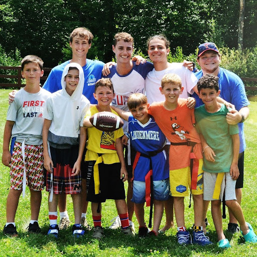 A team photo of boys in Flag Football gear.